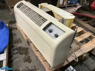 Wall Heater make and model unknown with slight exterior damage