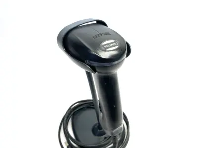 USED KEYENCE REV. H STANDARD CODE READER, WIRED, RED LED W/ COMM CABLE & STAND
