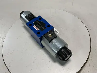 USED REXROTH 4WE10E67-33/CG24N9K4/T06