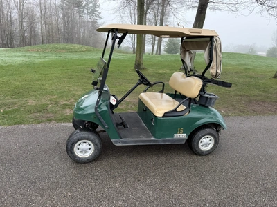 (1) 2015 E-Z-Go golf cart with a Kawasaki gas engine, includes Club canopy, ball washer, fold-down w...
