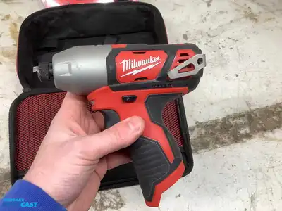 Lot of (1) Milwaukee M12 3/8” Right Angle Drill, (1) Milwaukee M12 1/4” Hex Impact Driver, and (1...