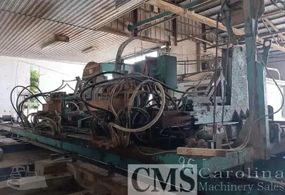 USED HELLE 3-HEAD BLOCK SAWMILL WITH VERTICAL EDGER