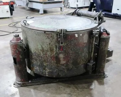 (2) Tolhurst 40" Center-Slung chip wringers.