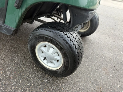 (1) 2015 E-Z-Go golf cart with a Kawasaki gas engine, includes canopy, ball cover, club cover, fold-...