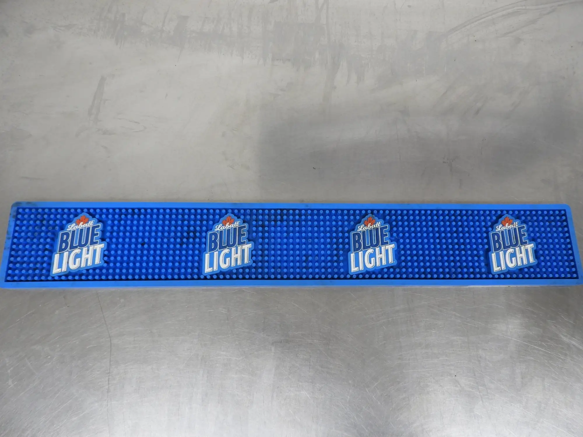 Used Falcon Restaurant Supply Used Labatt Blue Light Beer Tap Bar Mat Drip Catcher 23.25"x3.5" Bar Equipment Illinois US | Falcon Restaurant Supply #1376519