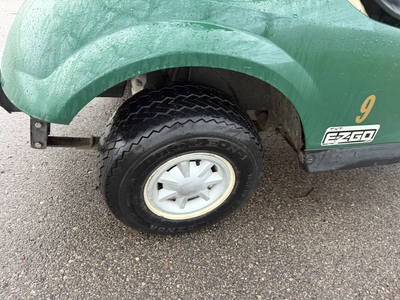 (1) 2015 E-Z-Go golf cart with a Kawasaki gas engine, includes canopy, ball cover, club cover, fold-...