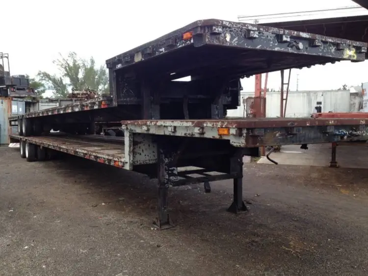 Used A PLUS DROP DECK TRAILER ROLL-OFF FLOORS Flatbed Trailers Florida US | USA Transequipment #1542527