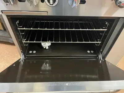 Used Dukers Used 36" Dukers DCR36-2B24GM Gas Range with 2 Burners & 24" Flat Top Griddle Commercial Ranges Illinois US | Falcon Restaurant Supply #1374958