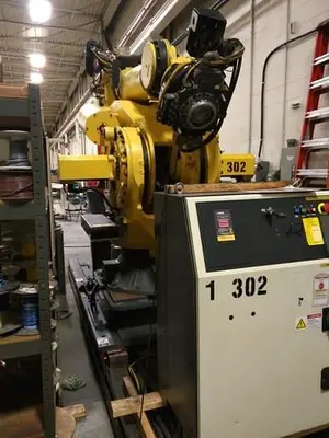 Used 2012 FANUC M900IB/700 6 AXIS CNC ROBOT WITH R30IB CONTROLLER  & 7TH AXIS 15' LONG TRACK. Robots | Harbor Machinery Inc. #1283286