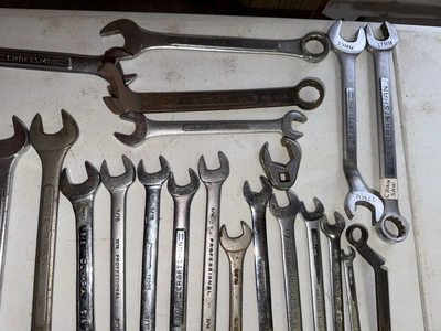 (1) tool box filled with assorted box end wrenches.