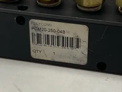 PCM20-250-04B | Polyconn  Pneumatic Manifold, 4x 1/4" NPT Out , 3/8"NPT IN - Used