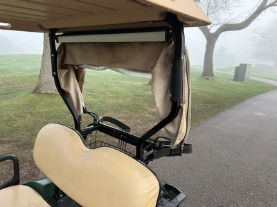 (1) 2015 E-Z-Go golf cart with a Kawasaki gas engine, includes canopy, ball cover, club cover, fold-...