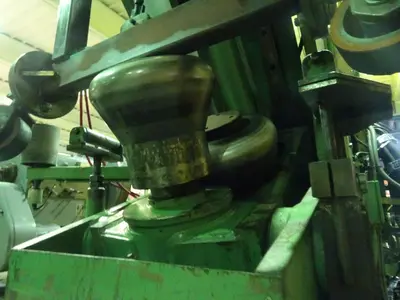 USED HAEUSLER FLANGING MACHINE