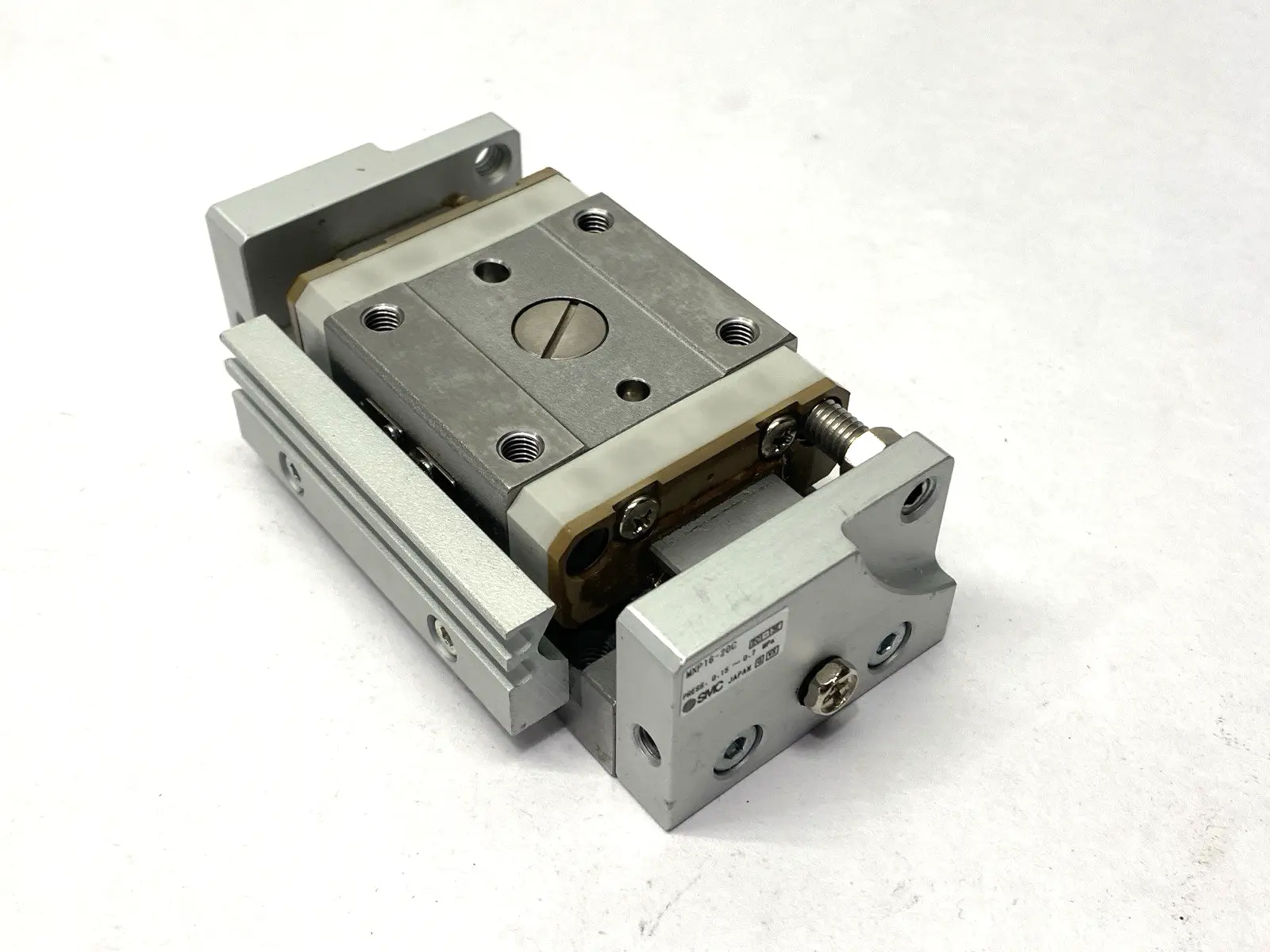 USED SMC PNEUMATIC SLIDE TABLE MISSING SHOCK ABSORBER