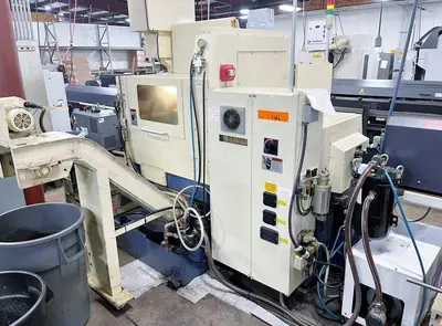 TSUGAMI SS20 CNC SWISS LATHE WITH FMB BARFEEDER
