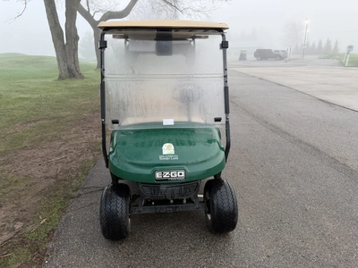 (1) 2017 E-Z-Go golf cart with a Kawasaki gas engine, model 625111G01, includes canopy, ball cover, ...