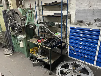 USED BUCH DCM-200 4/40 SPRING MAKING