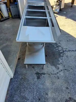 Winholt 10'  3 Comp. Sink w/  2 DRBD & 2 Shelves.  New Encore Fixtures & Drains