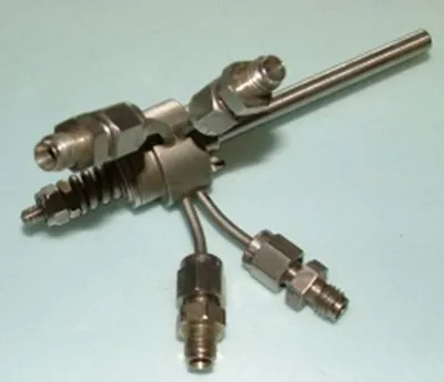 QTY. 1. VALCO VICI VALVE 4 PORT WITH FITTING....