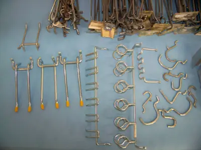 Large Lot of Peg Board Hangers