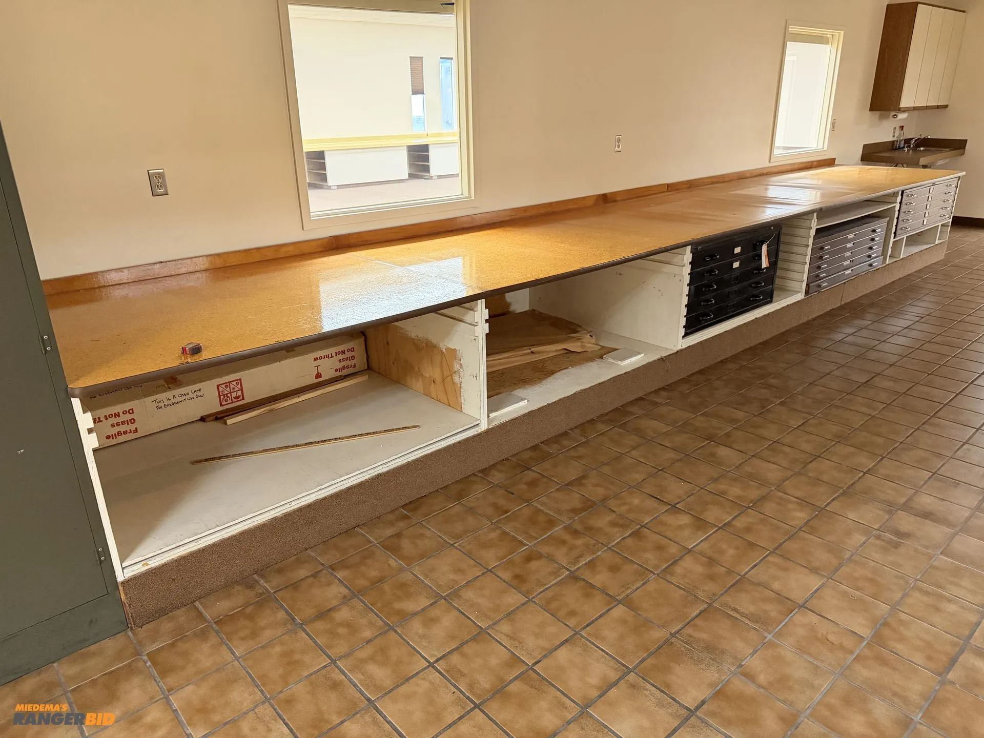 Used LARGE BUILT IN TABLE. COMES WITH TOP AND SUPPORTS. _UNKNOWN_ Work Benches Michigan US | Miedema Asset Management Group #1320834