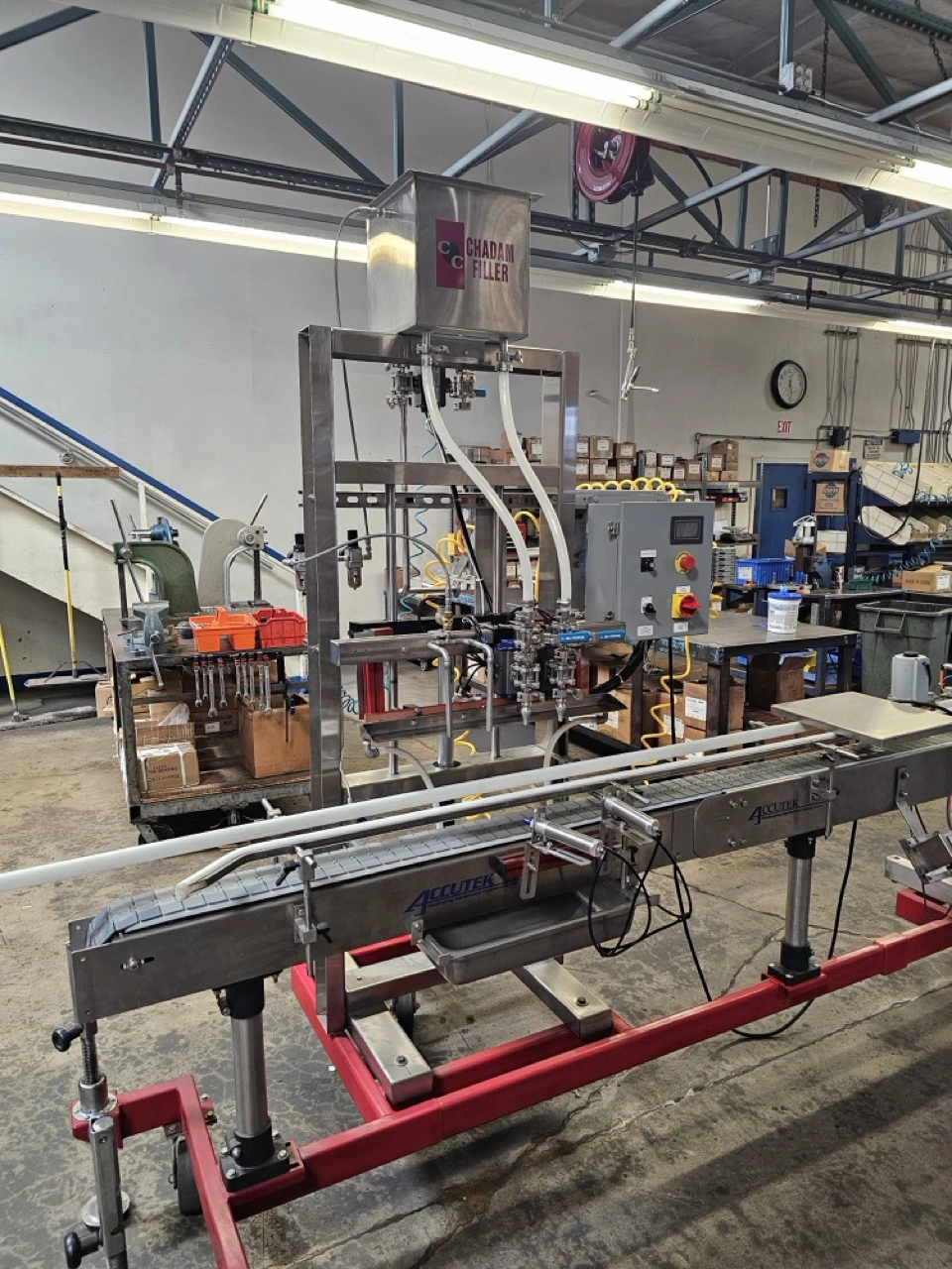 USED 1900 ACCUTEK/CHADAM 2 HEAD GRAVITY FILLER