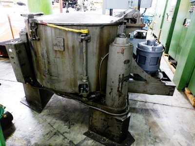 Tolhurst 40" Center-Slung chip wringer.