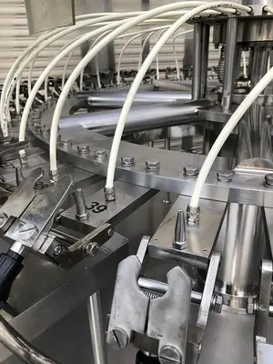 USED 2014 ZHANG J IAGANG, BEIJING CHINA TRI-BLOCK 40 VALVE BOTTLE RINSER, FILLER, CAPPER