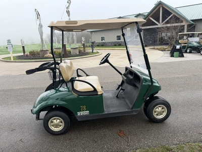 (1) 2014 E-Z-Go golf cart with a Kawasaki gas engine, does not include Club canopy, ball carrier, fo...