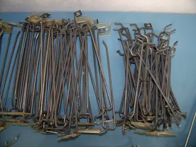 Large Lot of Peg Board Hangers