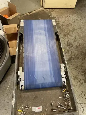 USED CONVEYOR CONVEYOR 27 1/2” LONG BY 11 3/4” WIDE.
