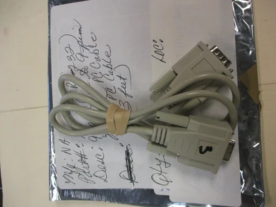 Used RS-232 Beige 9-pin Male to 9-pin Female PC Cable (Approx. 3 feet)