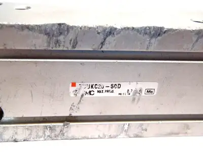 USED SMC FREE MOUNT COMPACT ACTUATOR CYLINDER W/ VACUUM 0.7