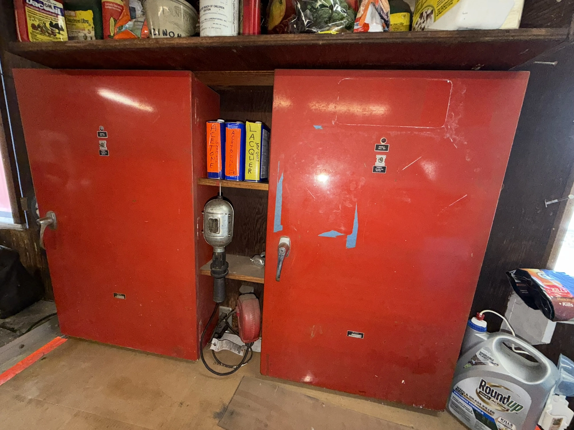 (2) Auto Call single door storage cabinets filled with assorted electrical items, including Push Mat...