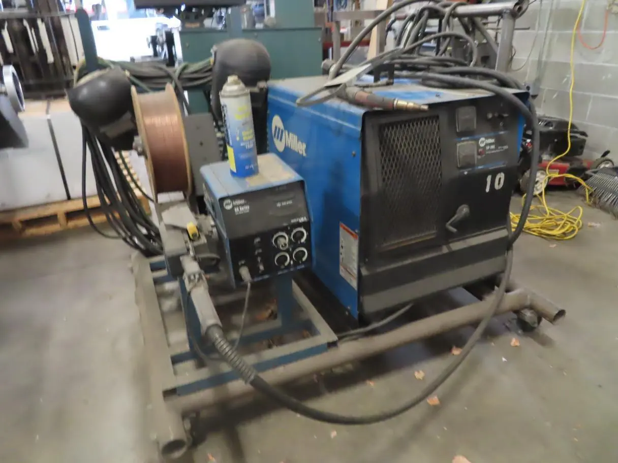 USED MILLER ELECTRIC MFG CP-302