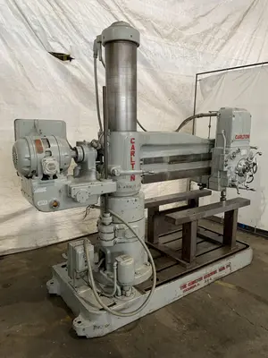 4' X 11" CARLTON 1A RADIAL ARM DRILL. STOCK # 0850023.