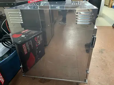 Used Henny Penny Used Henny Penny HC-903 CDT Heated Holding Pass Thru Cabinet with Flip Doors and Timers 120V Hot Food Warming, Holding, & Transport Cabinets Illinois US | Falcon Restaurant Supply #1375758