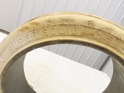 Super Solid 15x4x11-1/4 Forklift Tire Smooth Solid Press-on White Non-Marking