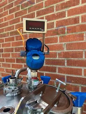 USED PURE FLO PRECISION 150 L STAINLESS STEEL JACKETED REACTOR 45 PSI W/ 0.5 HP MIXER