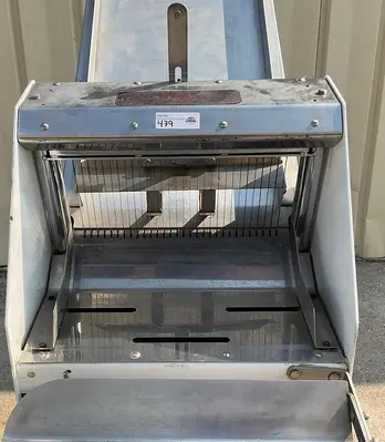 USED BAKERS AID BREAD SLICER GRAVITY FED