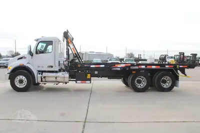 New | in-Stock 2027 PETERBILT 548 Rolloff Trucks Texas US | Roll Off Truck World #1492000