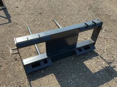 New JCT Bale Spear Skid Steer Attachment, Universal Quick Attach, Has Two Spears that Stick Out Appr...