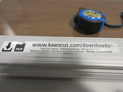 KEEN CUT 70" BENCH TOP PAPER CUTTER.