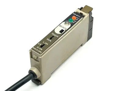 E3X-NT11 | Omron  Photoelectric Sensor w/ AMP 206429-1 Plug and Clamp NO COVER - Used
