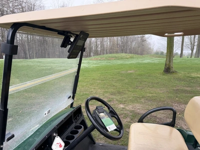 (1) 2015 E-Z-Go golf cart with a Kawasaki gas engine, does not include Club canopy, includes ball wa...
