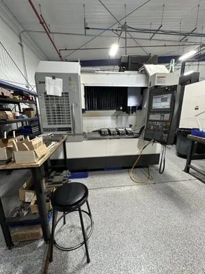 2018 OKUMA GENOS M560-V Vertical Machining Centers | Lion Machinery (1)