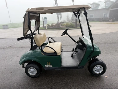 (1) 2017 E-Z-Go golf cart with a Kawasaki gas engine, model 625111G01, includes canopy, ball cover, ...