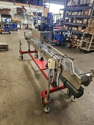 USED 1900 ACCUTEK/CHADAM 2 HEAD GRAVITY FILLER