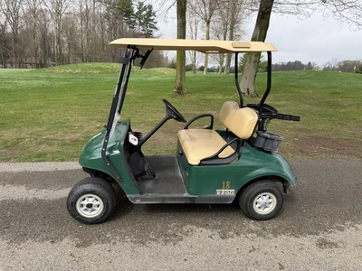 (1) 2015 E-Z-Go golf cart with a Kawasaki gas engine, does not include Club canopy, includes ball wa...