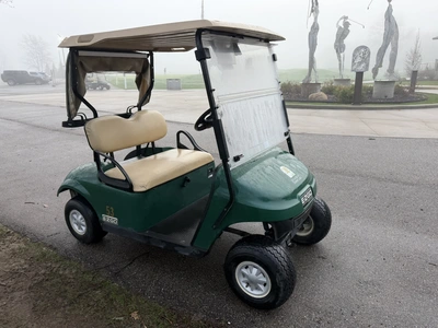 (1) 2017 E-Z-Go golf cart with a Kawasaki gas engine, model 625111G01,includes canopy, ball cover, c...